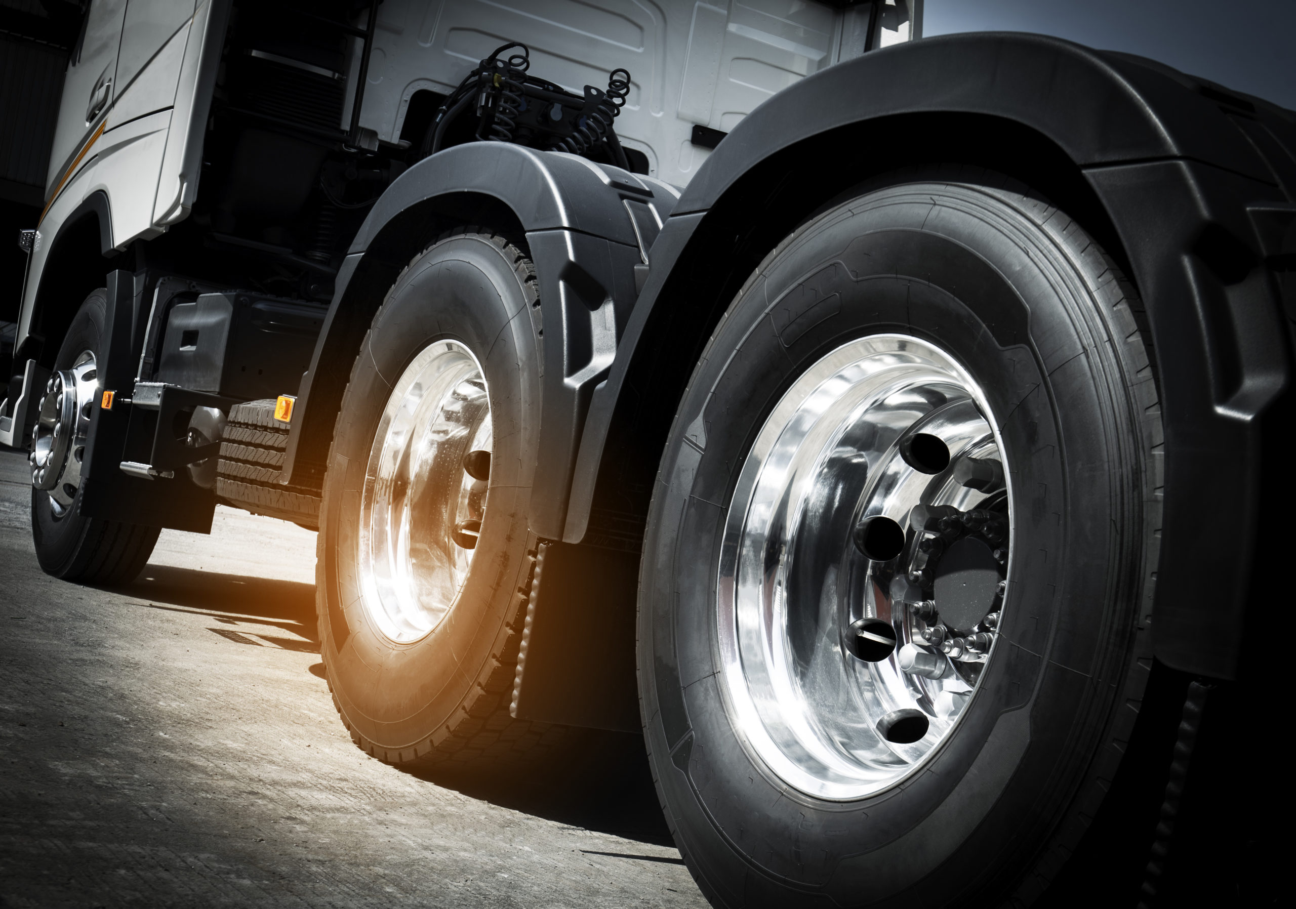 semi truck, closeup truck wheels with new truck tires